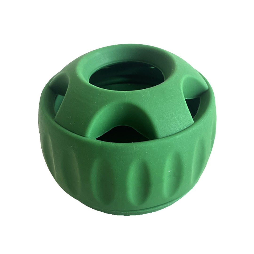 Green silicone slow feeder ball close-up