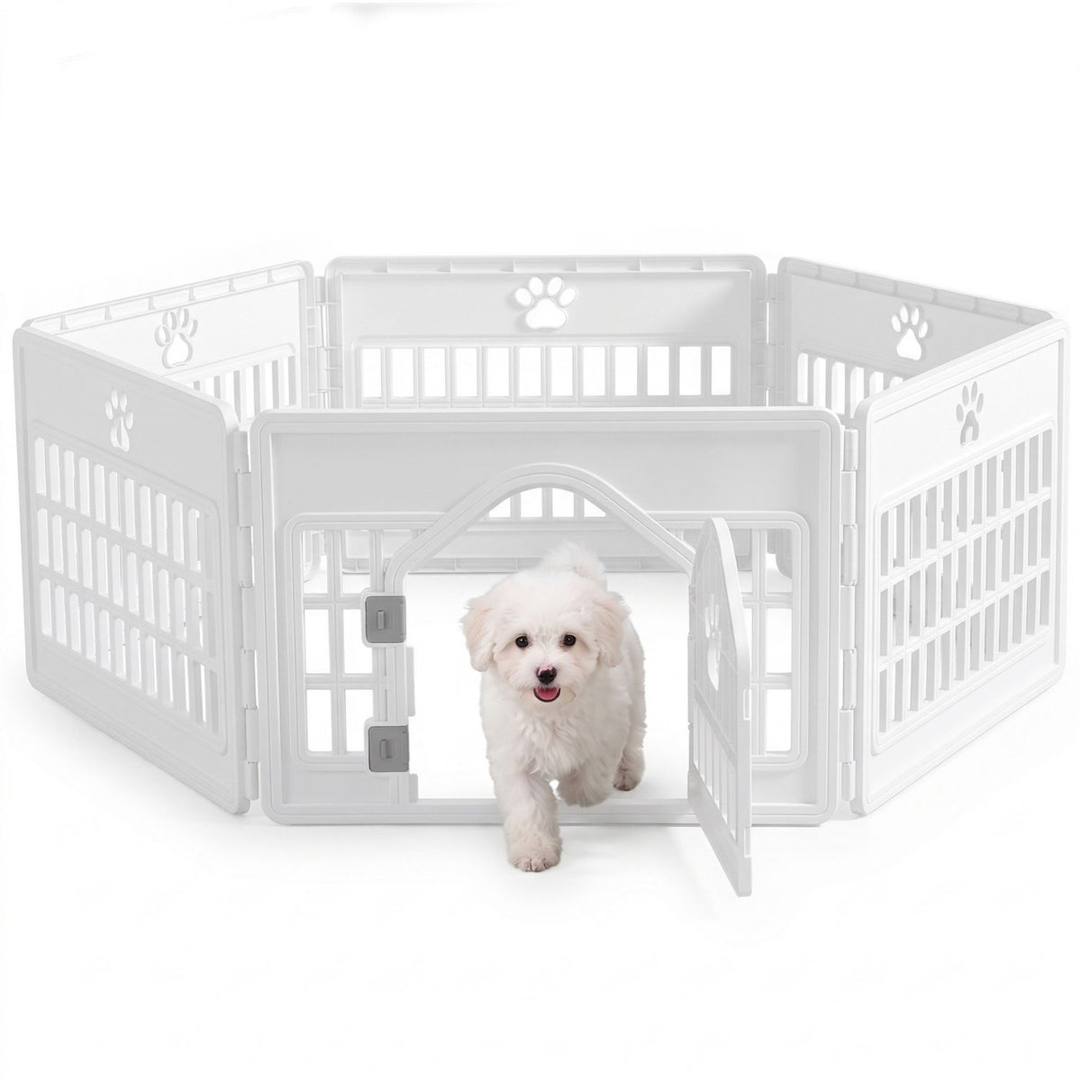 White 6-panel modular plastic dog playpen with paw print cutouts and locking door; small white fluffy dog walking out of the portable pet fence