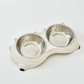 White double macaron stainless steel pet bowl with bone-shaped plastic base