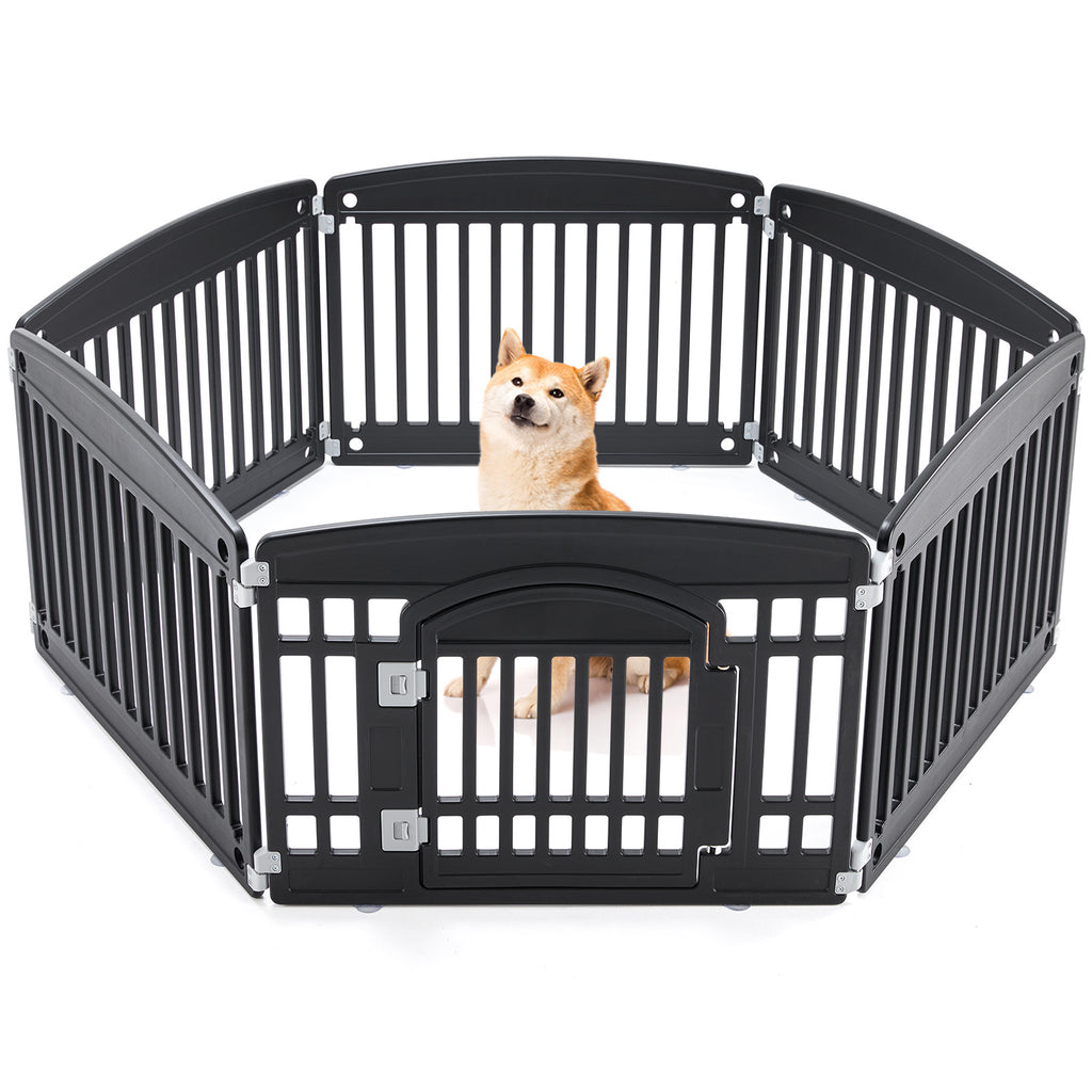 Black 6-panel plastic dog playpen with vertical slats and gate door; Shiba Inu sitting inside the portable pet fence