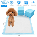 Brown poodle sitting on blue 50-pack dog training pad, 24 by 18 inch size M with quick dry and leak-proof icons