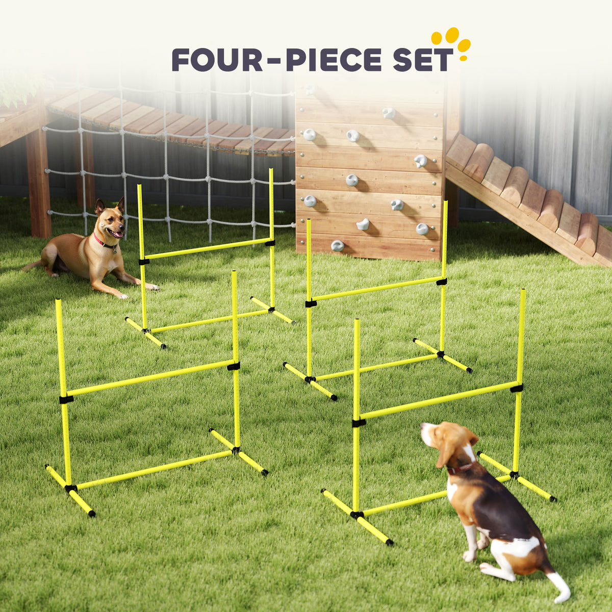 Four-piece yellow agility jump bar set on grass with two dogs and a wooden climbing wall
