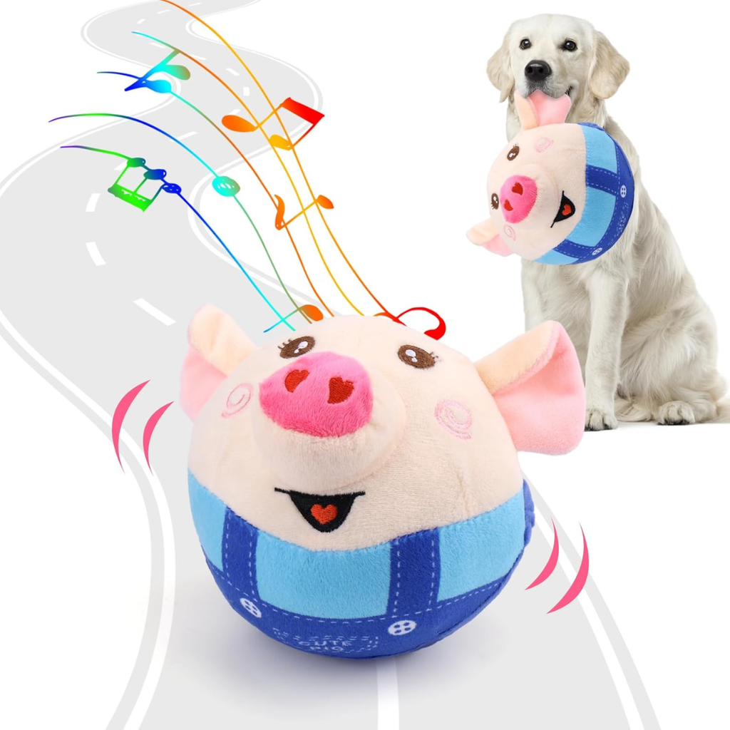 Pink plush pig dog toy in blue overalls with musical notes, golden retriever holding one