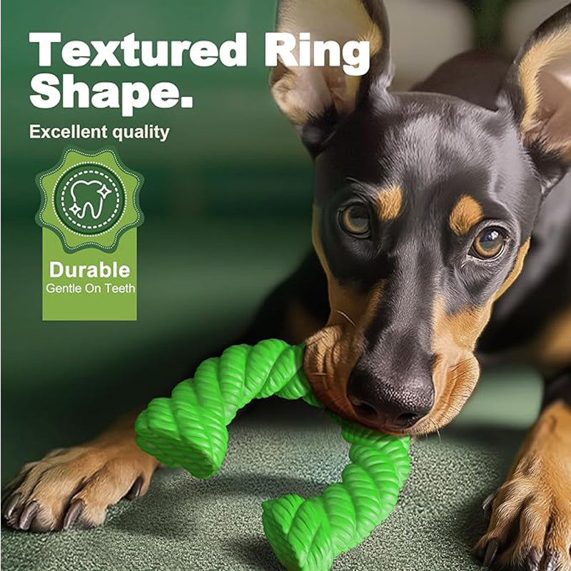 Dog holding green textured horseshoe chew toy in mouth with durable gentle on teeth badge