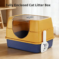 Orange and blue two-tone enclosed cat litter box, angled view