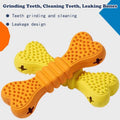 Two bone-shaped dog chew sticks in orange and yellow with spiky nubs for teeth grinding and cleaning