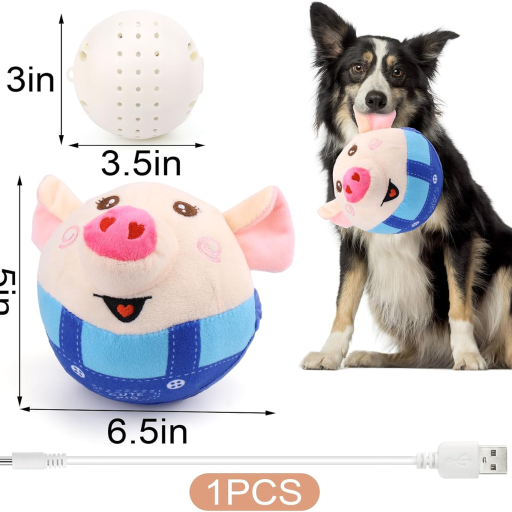Pink plush pig dog toy size diagram with USB charging cable and dog holding the toy