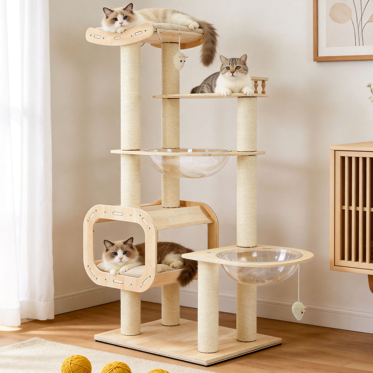 Natural wood 4-story cat tree with three cats, sisal columns, open condo and space capsules