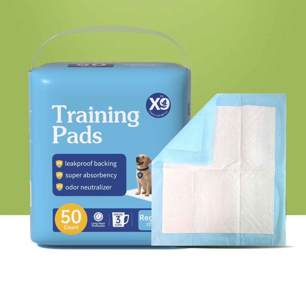 Blue 50-count X9 training pads package with single white quilted pad in front, holds 3 cups