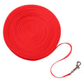 red long dog training leash coiled with metal swivel clip on white background