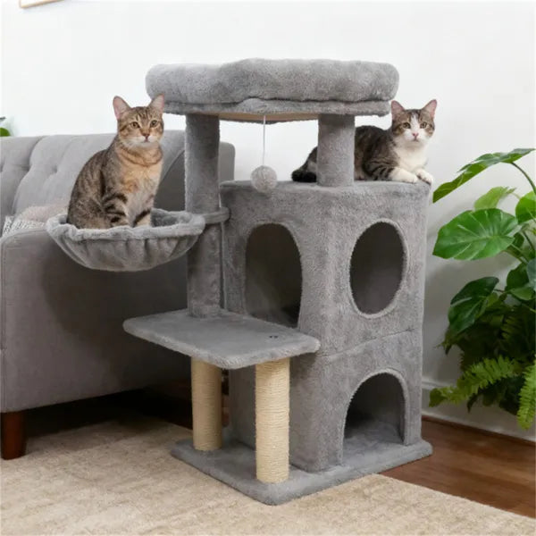 Two tabby cats lounging on light gray cat tree in a living room