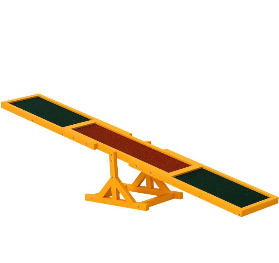 Isolated product shot of the wooden dog agility seesaw with yellow frame, green anti-slip end pads, and central pivot base on a white background.