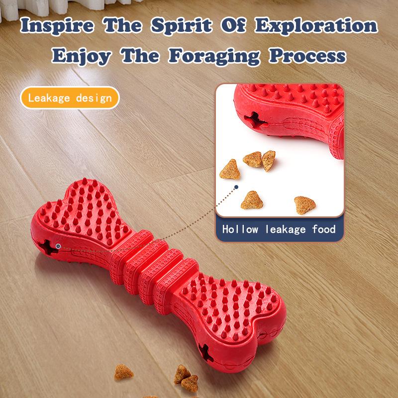 Red bone chew stick with spiky nubs and hollow treat leakage design on wooden floor