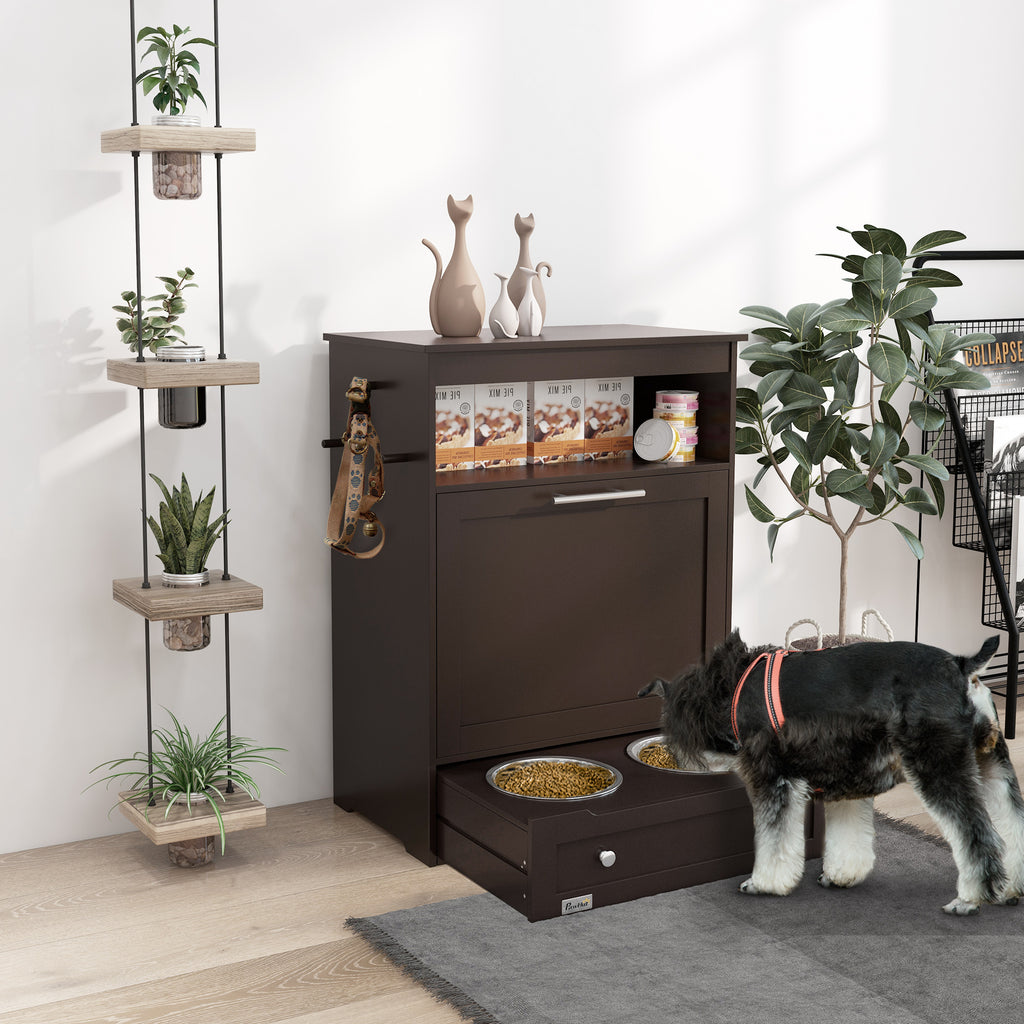 Schnauzer eating from a gray pet feeder station storage cabinet – raised dog bowls in pull-out tray with pet food storage