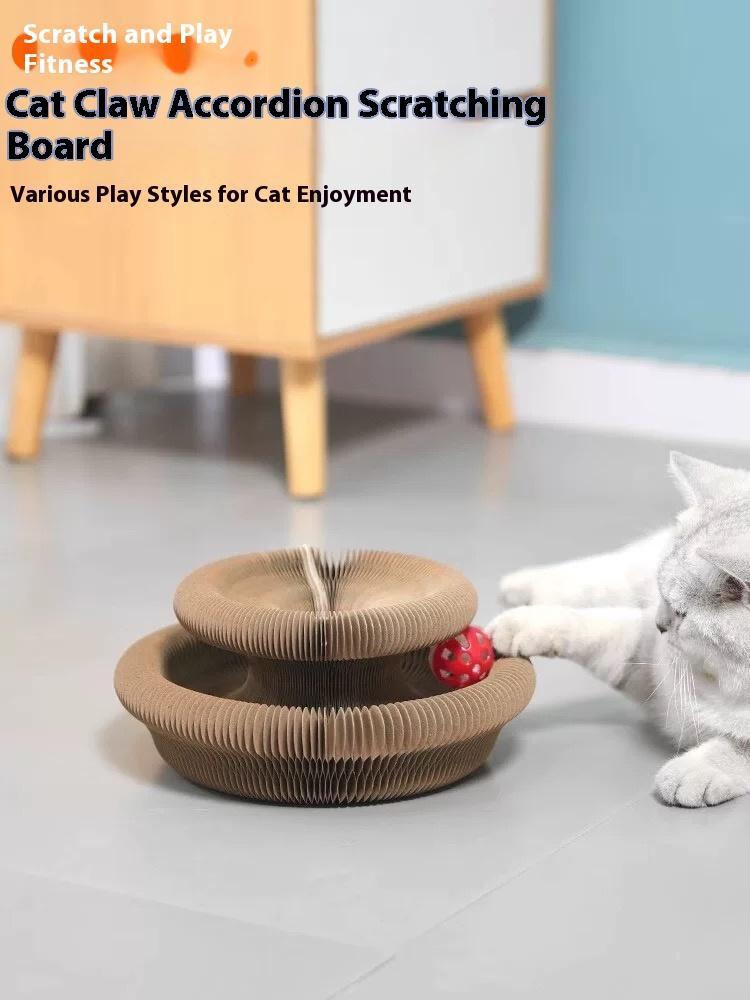 Lifestyle graphic of a white cat playing with the accordion scratching board and red ball, captioned scratch and play fitness.