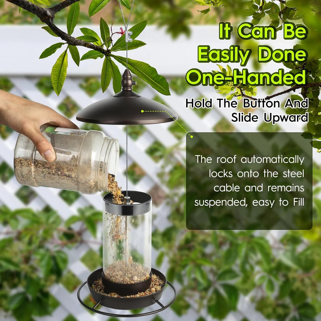 hand pouring bird seed into bronze metal roof bird feeder showing easy one-handed refill with slide-up roof
