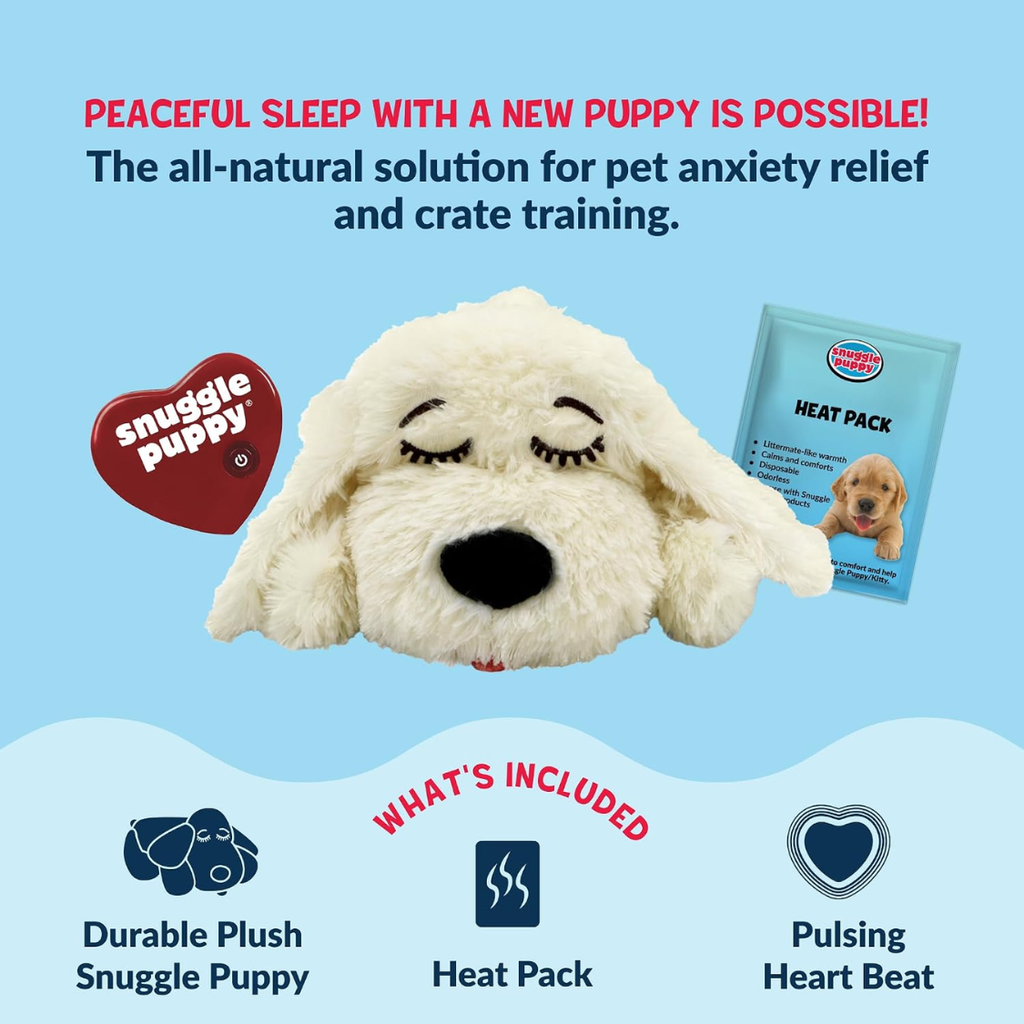 Dog holding a cream plush heartbeat toy in its mouth