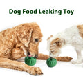 Two dogs playing with green silicone slow feeder balls