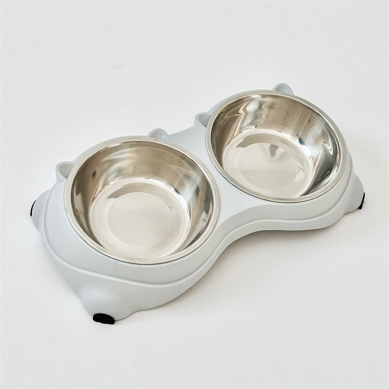 Gray double macaron stainless steel pet bowl with bone-shaped plastic base, angled view