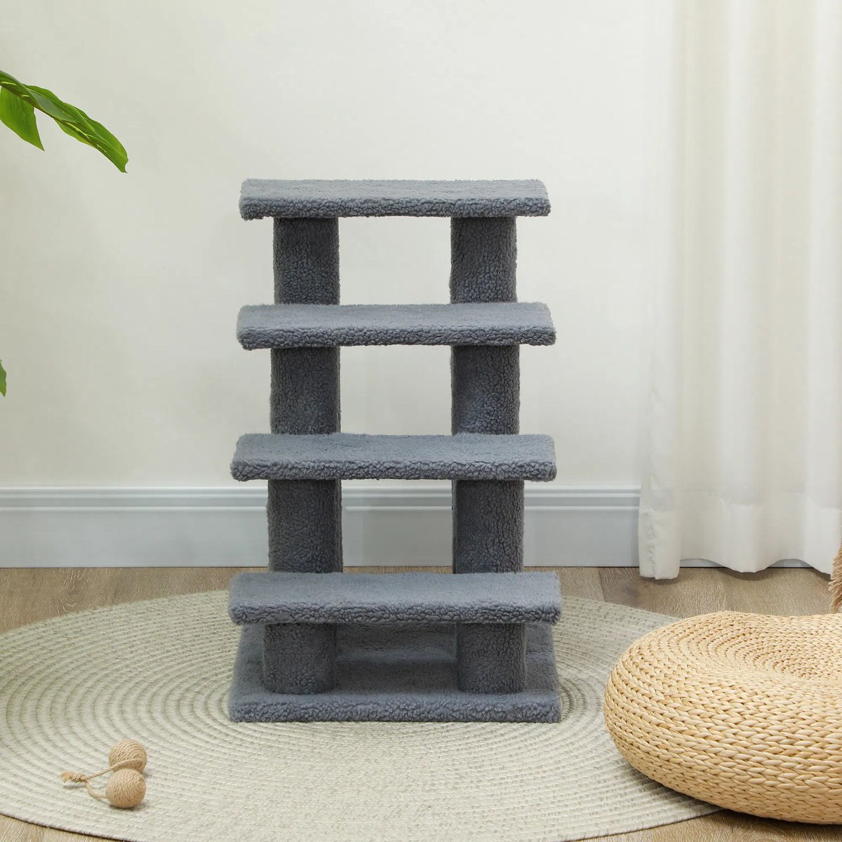 Grey pet stairs with 8 scratching posts, angled view